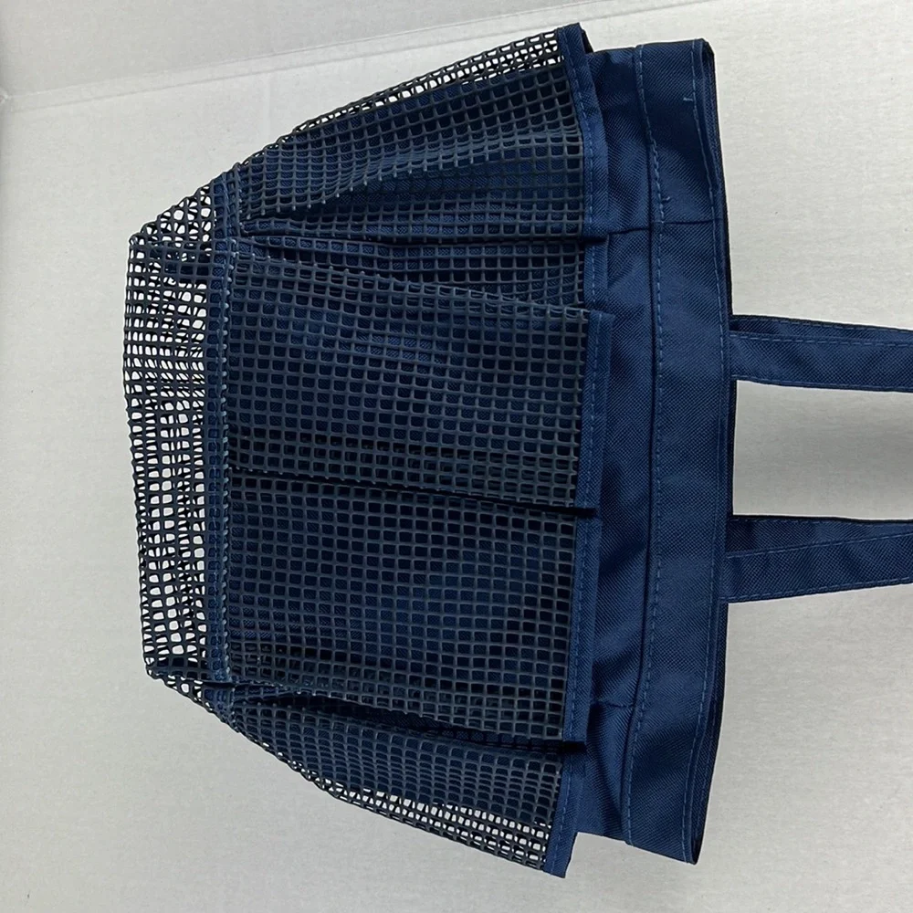 Mesh shower caddy navy. Has a mesh bottom for drainage